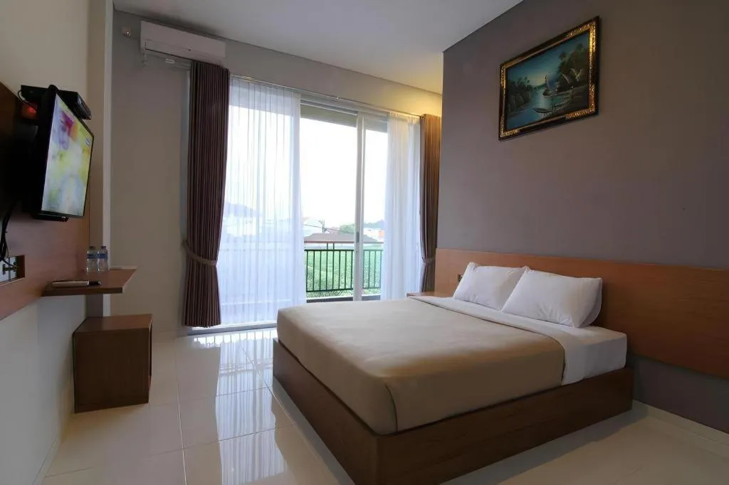 Bed in MANDARI HOTEL SINGARAJA