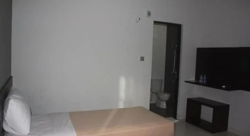 Bed in MANDARI HOTEL SINGARAJA