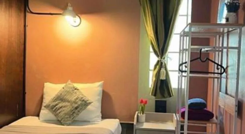 Bed in Nora Bukit Hotel