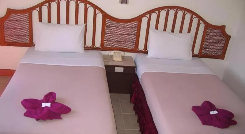 Bed in Nora Bukit Hotel