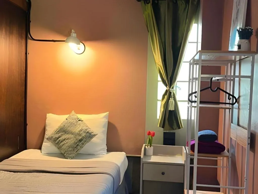 Bed in Nora Bukit Hotel