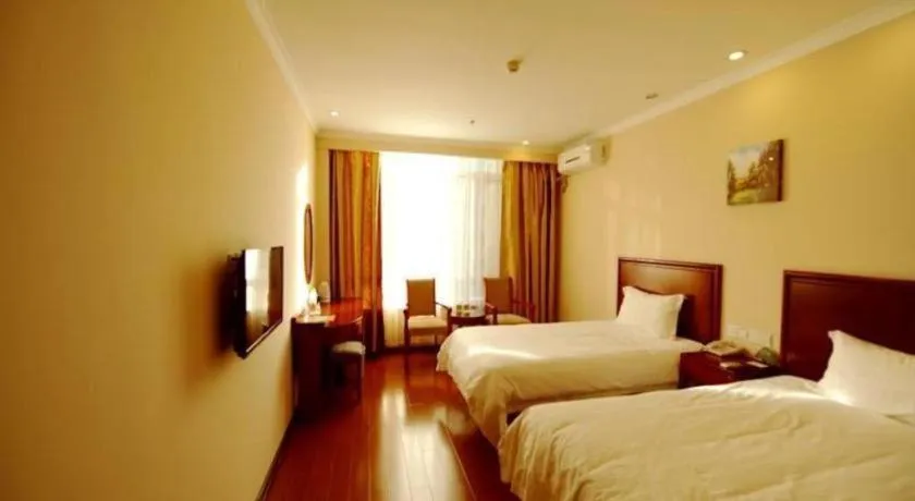Bed in GreenTree Inn Qinhuangdao Peace Avenue Express Hotel