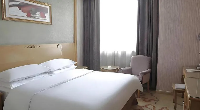 Bed in Vienna Classic Hotel Suzhou Likou Furniture Market Metro Station