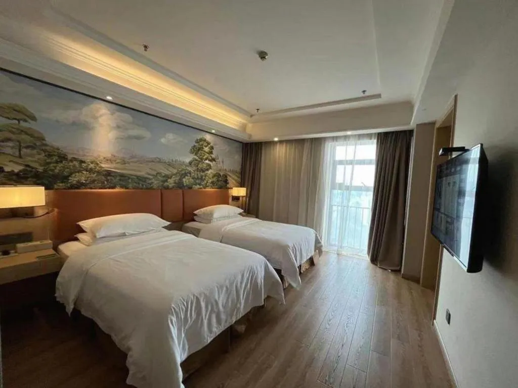 Bed in Vienna Hotel Jiangsu Danyang Railway Station