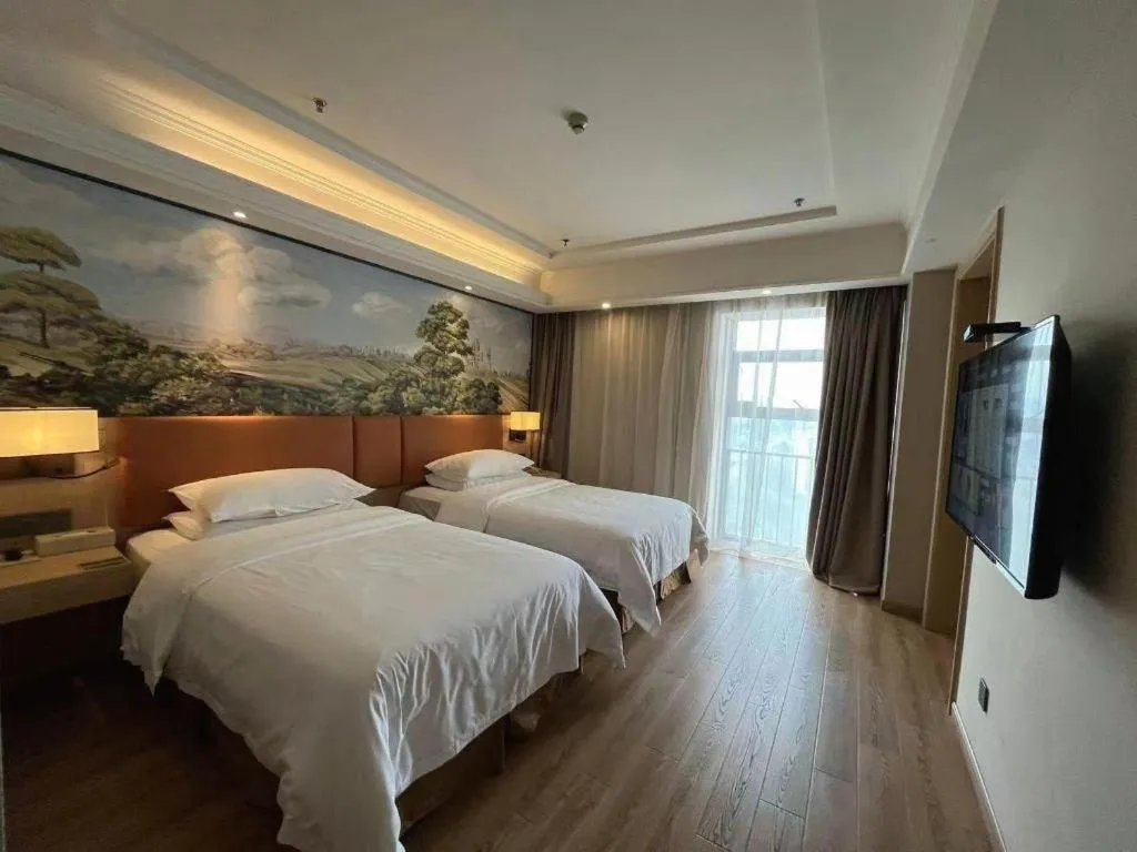 Bed in Vienna Hotel Jiangsu Danyang Railway Station