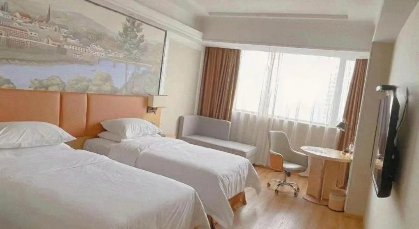 Bed in Vienna Hotel Jiangsu Danyang Railway Station