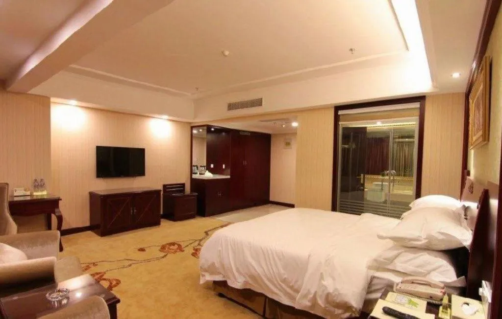 Bed in Vienna Hotel Yangzhou Outlets Plaza He Garden