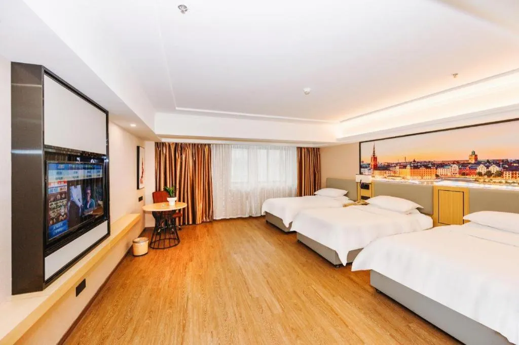 Bed in Vienna Hotel Yangzhou Outlets Plaza He Garden