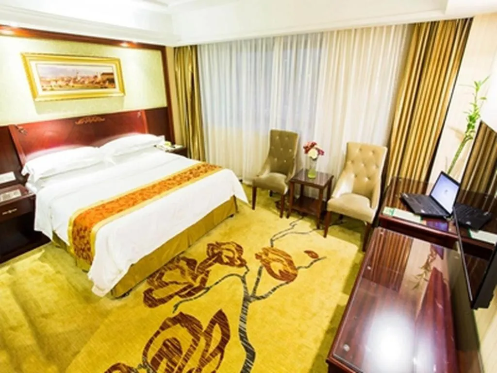 Bed in Vienna Hotel Yangzhou Outlets Plaza He Garden