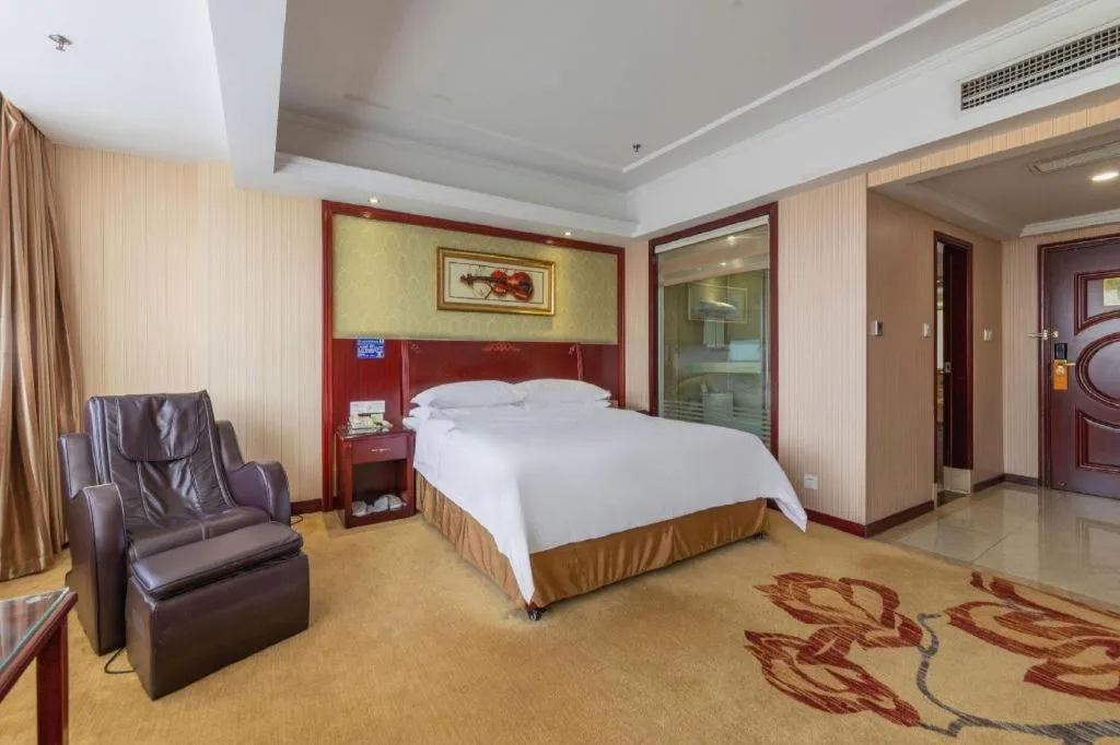 Bed in Vienna Hotel Yangzhou Outlets Plaza He Garden