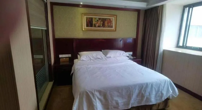 Bed in Vienna Hotel Yangzhou Outlets Plaza He Garden