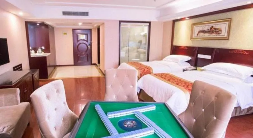 Bed in Vienna Hotel Yangzhou Outlets Plaza He Garden