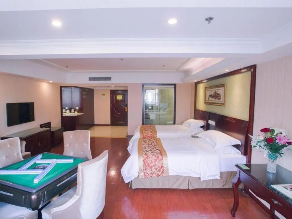 Bed in Vienna Hotel Yangzhou Outlets Plaza He Garden