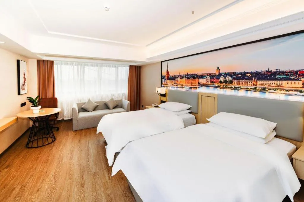 Bed in Vienna Hotel Yangzhou Outlets Plaza He Garden