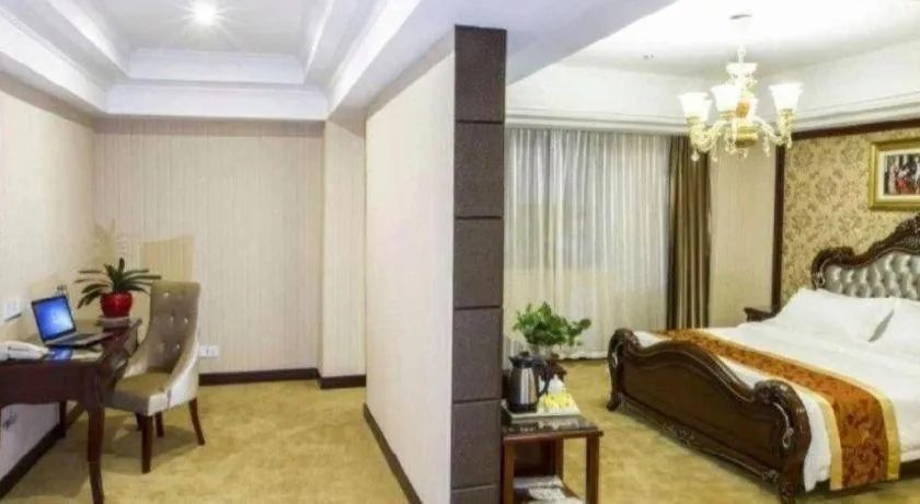 Bed in Vienna Hotel Yangzhou Outlets Plaza He Garden