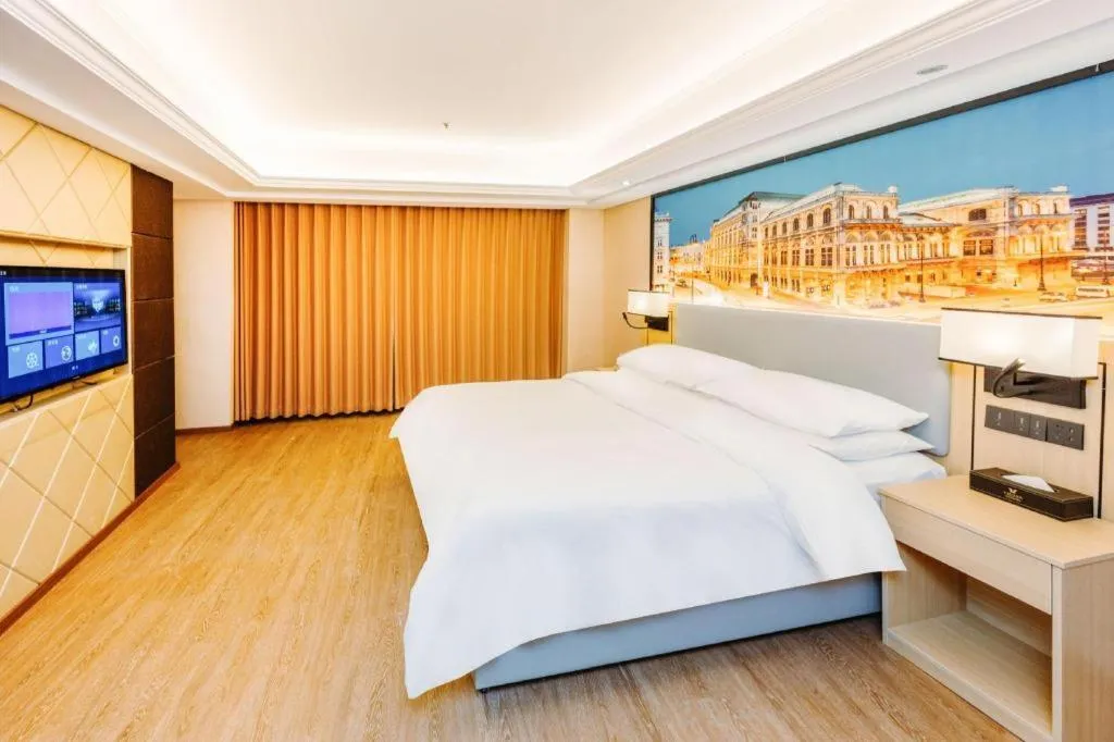 Bed in Vienna Hotel Yangzhou Outlets Plaza He Garden