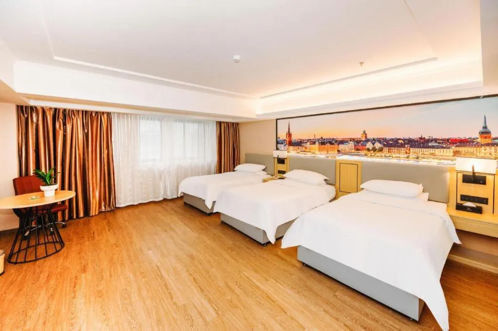 Bed in Vienna Hotel Yangzhou Outlets Plaza He Garden