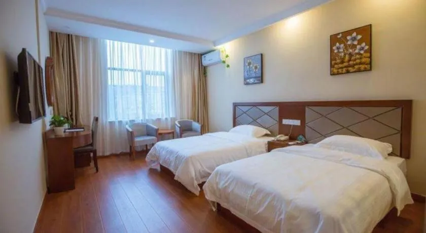 Bed in GreenTree Inn Wuxi Donggang Town Donghutang Shell Hotel