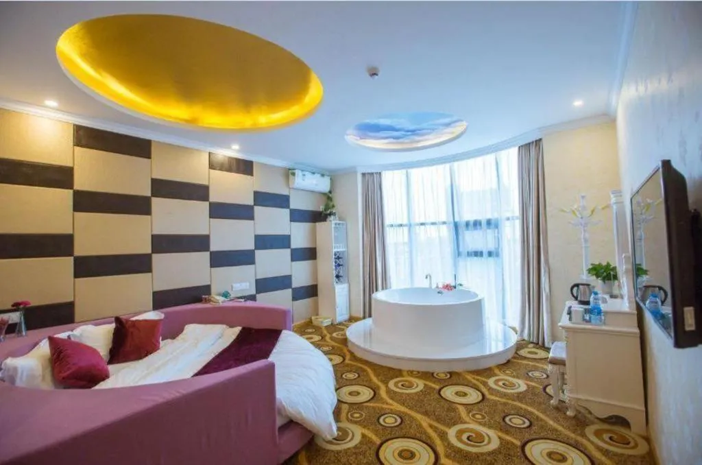 Bed in GreenTree Inn Wuxi Donggang Town Donghutang Shell Hotel