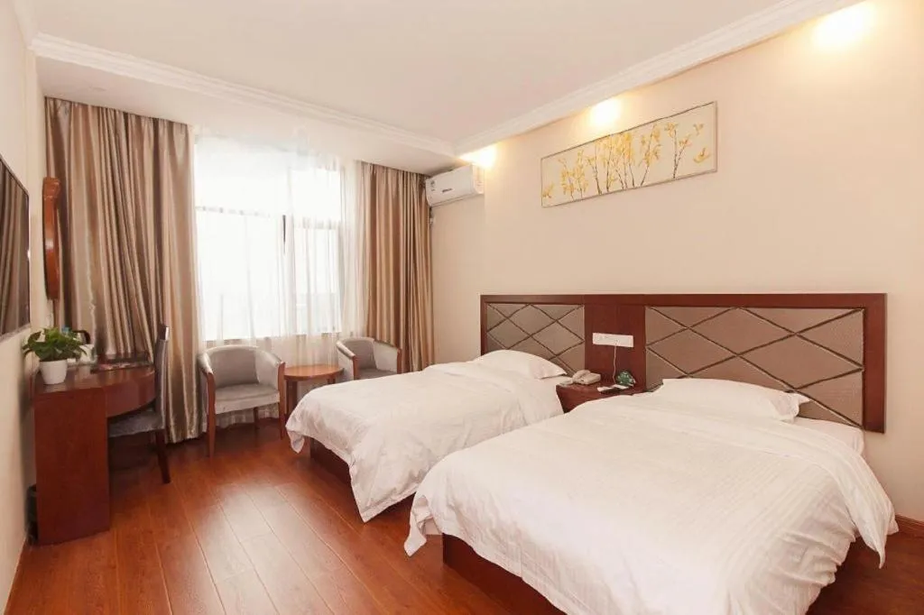 Bed in GreenTree Inn Wuxi Donggang Town Donghutang Shell Hotel