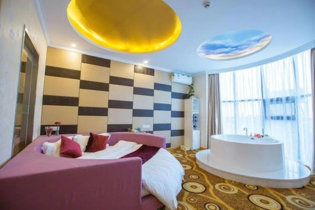 Bed in GreenTree Inn Wuxi Donggang Town Donghutang Shell Hotel