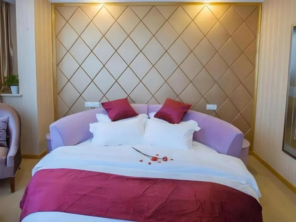 Bed in GreenTree Inn Wuxi Donggang Town Donghutang Shell Hotel