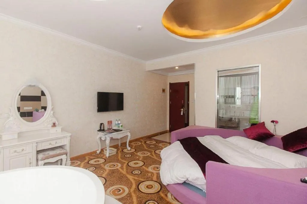 Bed in GreenTree Inn Wuxi Donggang Town Donghutang Shell Hotel