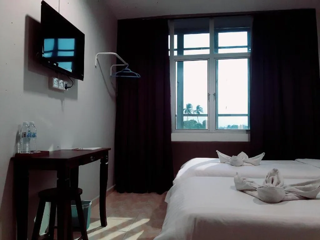 Bed in De Chukai Hotel