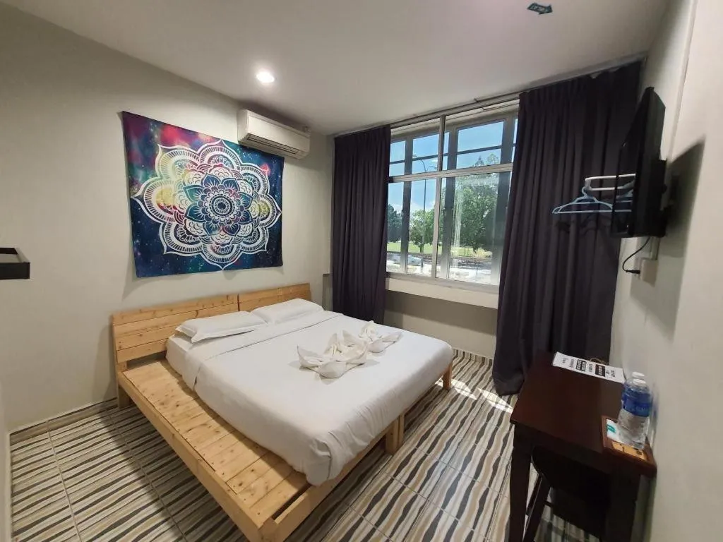 Bed in De Chukai Hotel