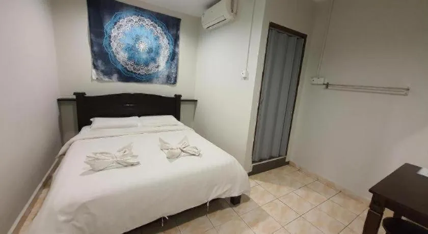 Bed in De Chukai Hotel