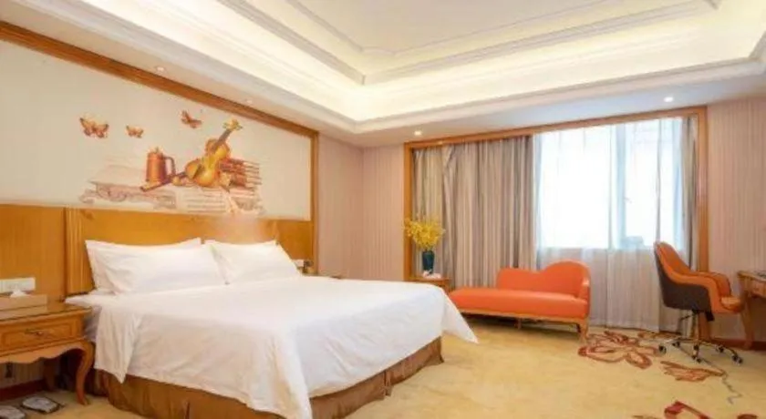 Bed in Vienna International Hotel Guangzhou Jichang Road Huangshi