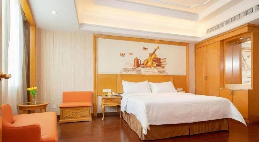 Bed in Vienna International Hotel Guangzhou Jichang Road Huangshi