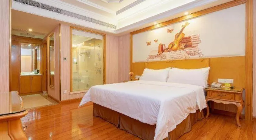 Bed in Vienna International Hotel Guangzhou Jichang Road Huangshi