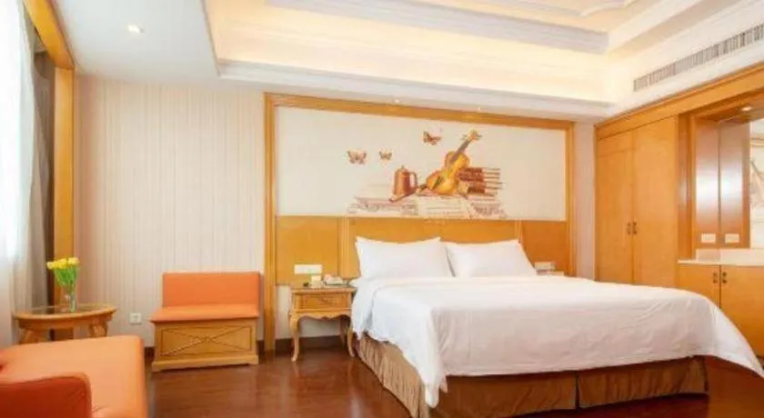 Bed in Vienna International Hotel Guangzhou Jichang Road Huangshi