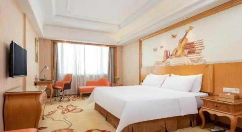 Bed in Vienna International Hotel Guangzhou Jichang Road Huangshi