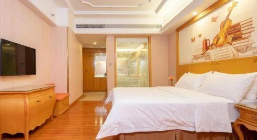 Bed in Vienna International Hotel Guangzhou Jichang Road Huangshi