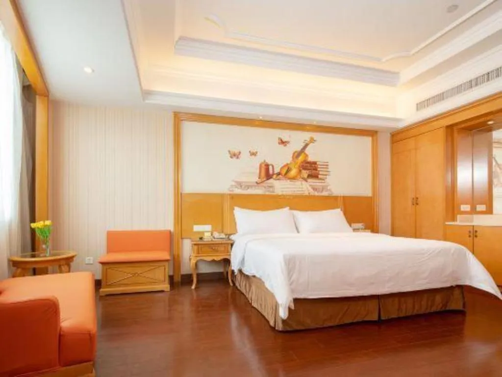 Bed in Vienna International Hotel Guangzhou Jichang Road Huangshi