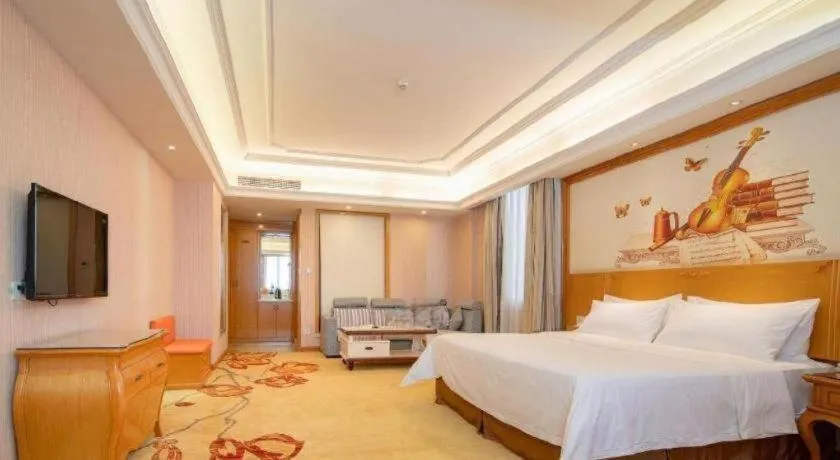 Bed in Vienna International Hotel Guangzhou Jichang Road Huangshi
