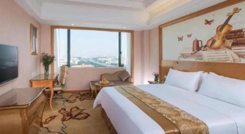 Bed in Vienna International Hotel Guangzhou Jichang Road Huangshi