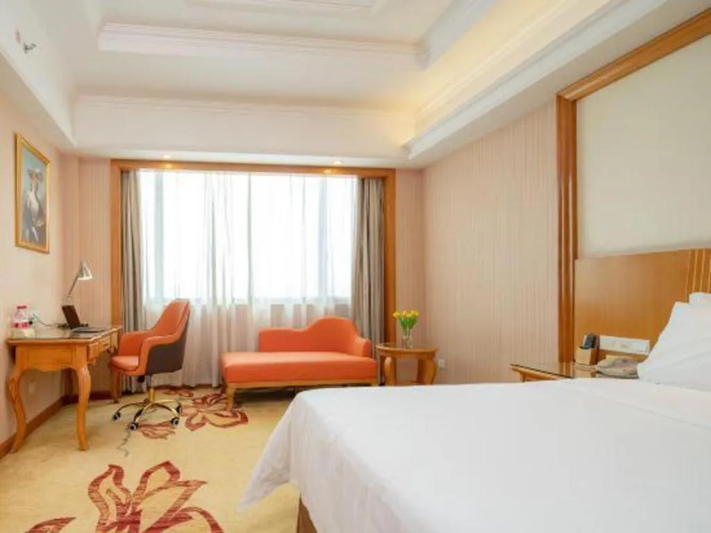 Bed in Vienna International Hotel Guangzhou Jichang Road Huangshi