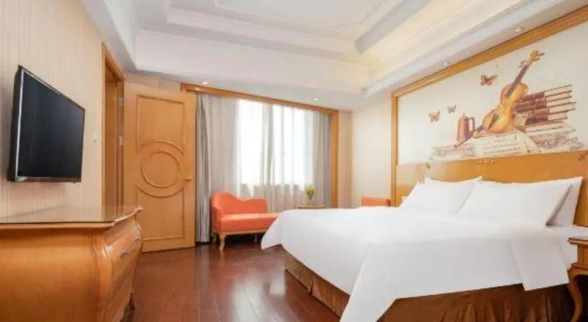 Bed in Vienna International Hotel Guangzhou Jichang Road Huangshi