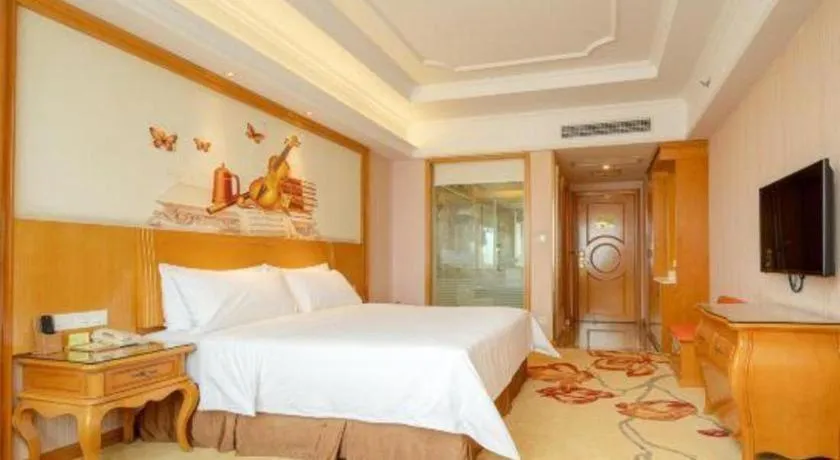 Bed in Vienna International Hotel Guangzhou Jichang Road Huangshi
