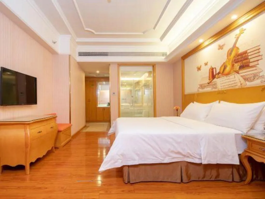 Bed in Vienna International Hotel Guangzhou Jichang Road Huangshi