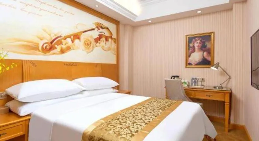 Bed in Vienna International Hotel Guangzhou Jichang Road Huangshi
