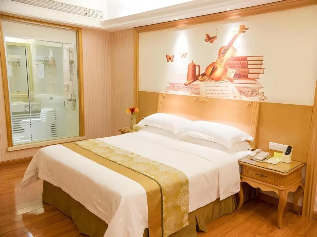 Bed in Vienna International Hotel Guangzhou Jichang Road Huangshi