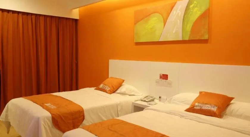 Bed in Shell Qionghai Jinhai Road Hotel