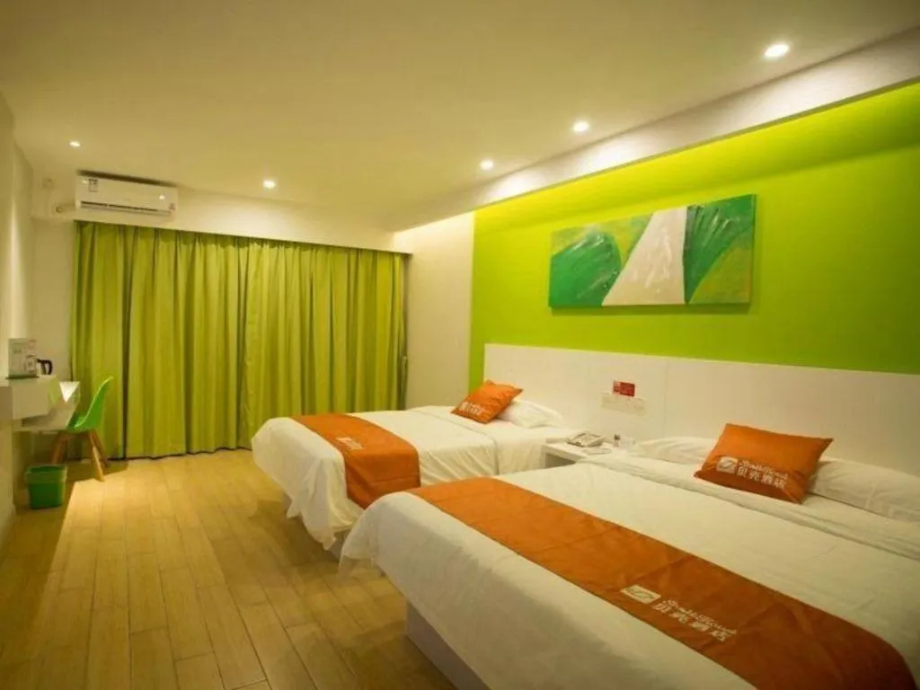 Bed in Shell Qionghai Jinhai Road Hotel