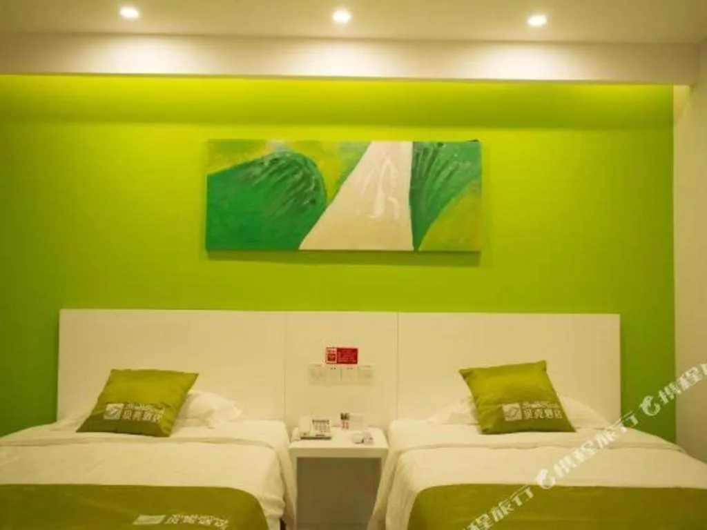 Bed in Shell Qionghai Jinhai Road Hotel