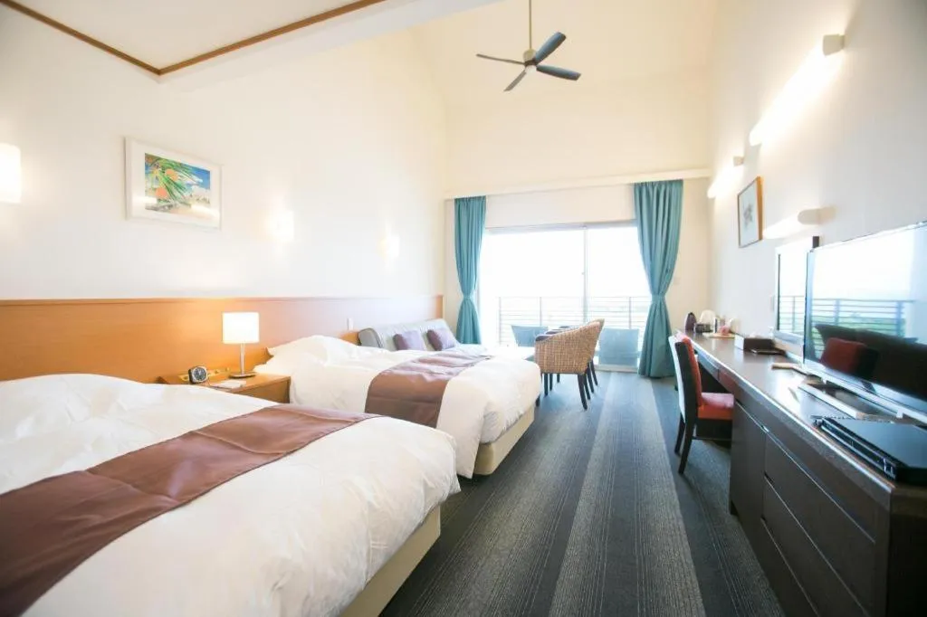 Bed in Sakura Resort Hotel Ishigaki