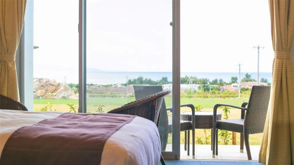 Bed in Sakura Resort Hotel Ishigaki